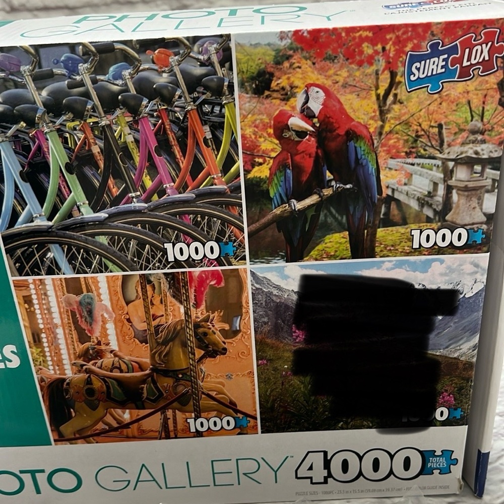 Three 1000 piece puzzles sealed merry go round parrots and bikes